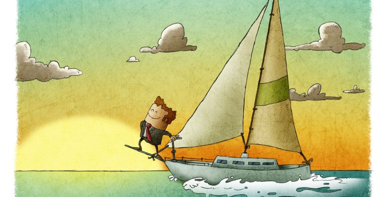 happy business man sailing on a yacht