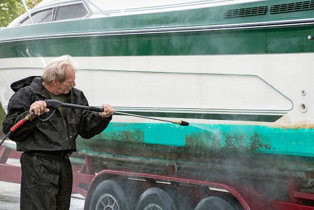 using a power hose on a dirty boat