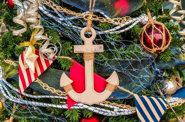 Nautical themed decorations on a christmas tree, anchor ornament etc.