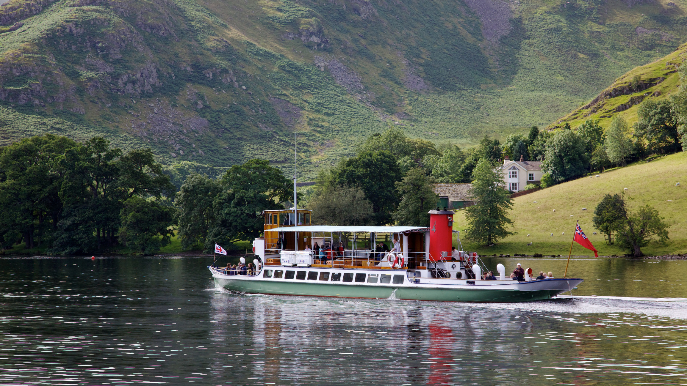 Tourists aboard the 'Raven' on Ullswater, in the English Lake District