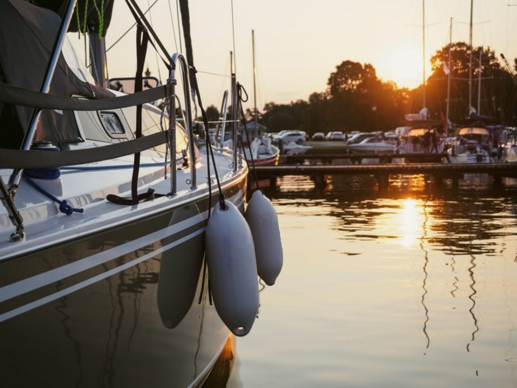 A boat docked at a marina