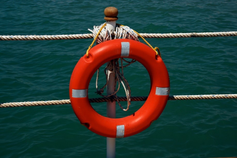 life ring tied to the side of a boat