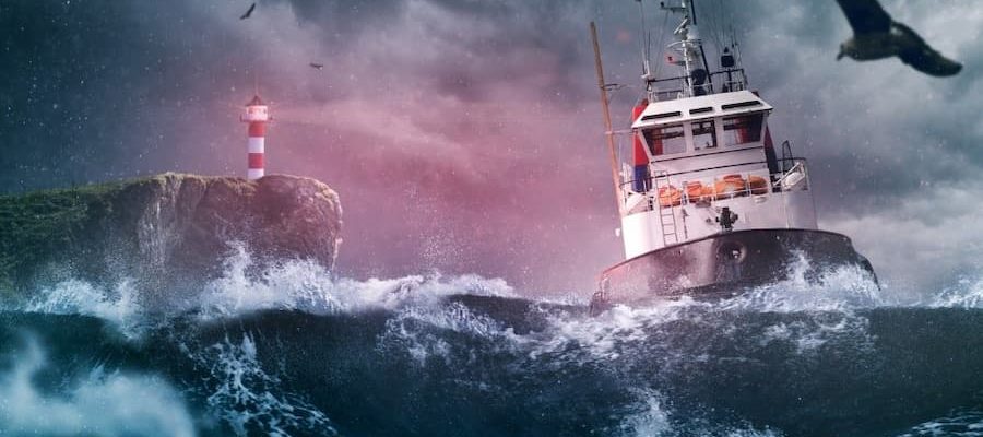 stormy sea with boat and lighthouse